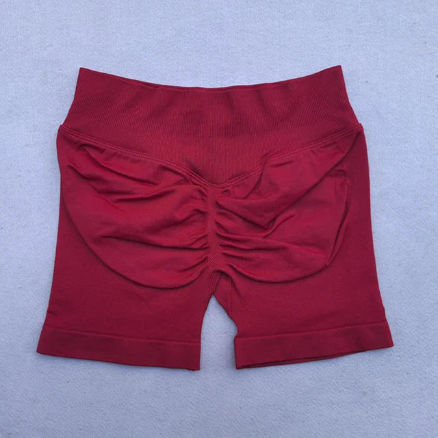 Conjunto Deportivo de 2 Piezas para Mujer
Top ajustable + shorts deportivos sin costuras