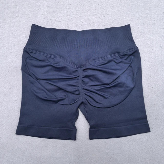 Conjunto Deportivo de 2 Piezas para Mujer
Top ajustable + shorts deportivos sin costuras