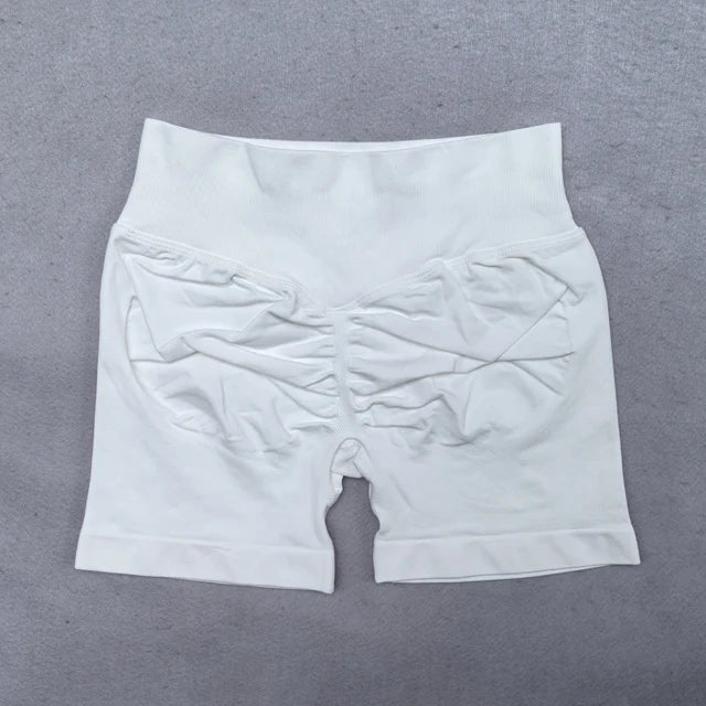 Conjunto Deportivo de 2 Piezas para Mujer

Top ajustable + shorts deportivos sin costuras