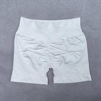 Conjunto Deportivo de 2 Piezas para Mujer

Top ajustable + shorts deportivos sin costuras
