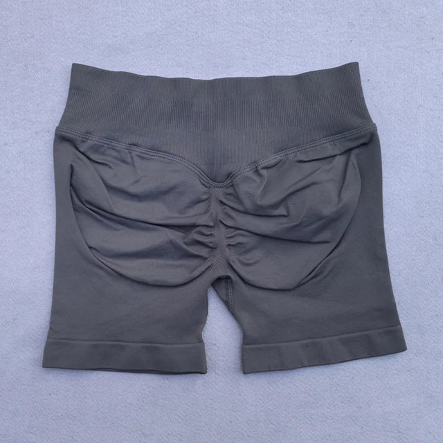 Conjunto Deportivo de 2 Piezas para Mujer

Top ajustable + shorts deportivos sin costuras