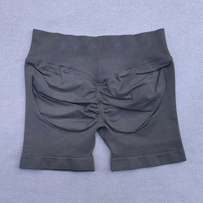 Conjunto Deportivo de 2 Piezas para Mujer

Top ajustable + shorts deportivos sin costuras