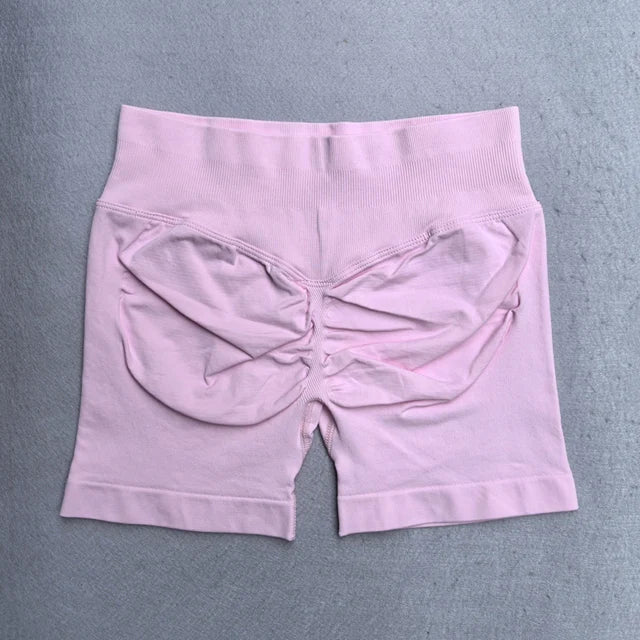 Conjunto Deportivo de 2 Piezas para Mujer

Top ajustable + shorts deportivos sin costuras